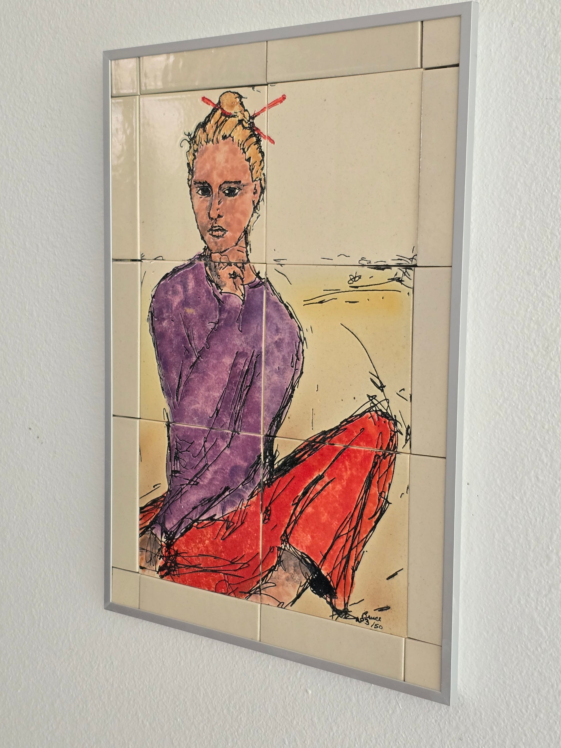 This is a side view of a set of 20 mounted and framed tiles depicting a woman with chopsticks. The woman is dressed in a purple sweatshirt and red pants. 
The tiles are made of cream-colored porcelain. they are mounted on a waterproof board and framed with an aluminum frame.